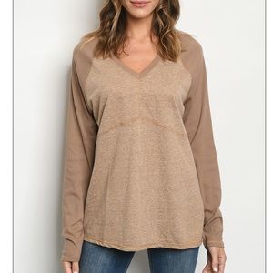 Mocha V-neck two-tone top w/ stitch detail.